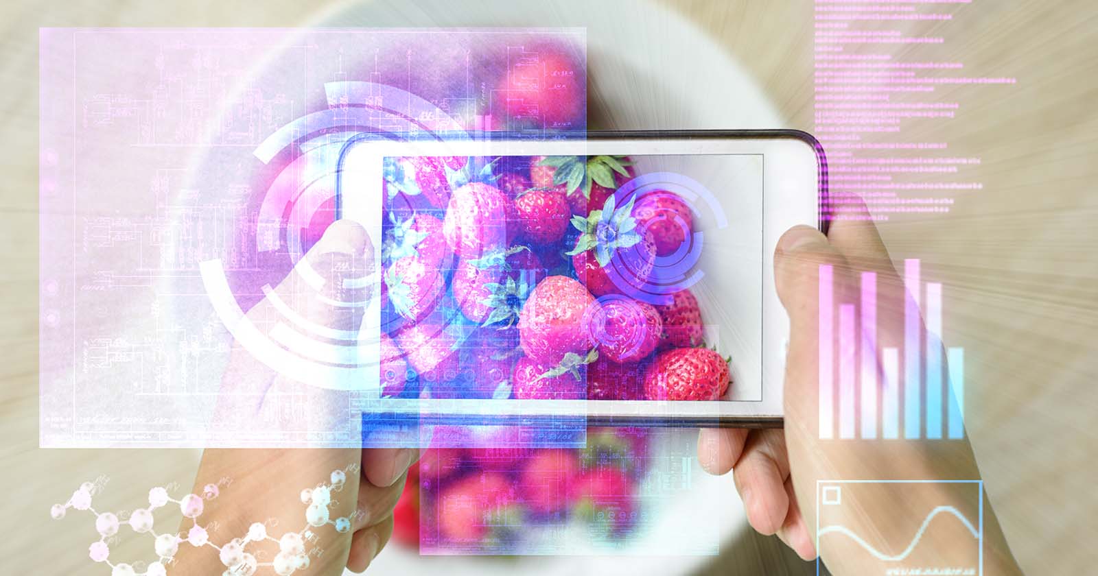 hands holding an iphone while capturing an image of strawberries and collecting data