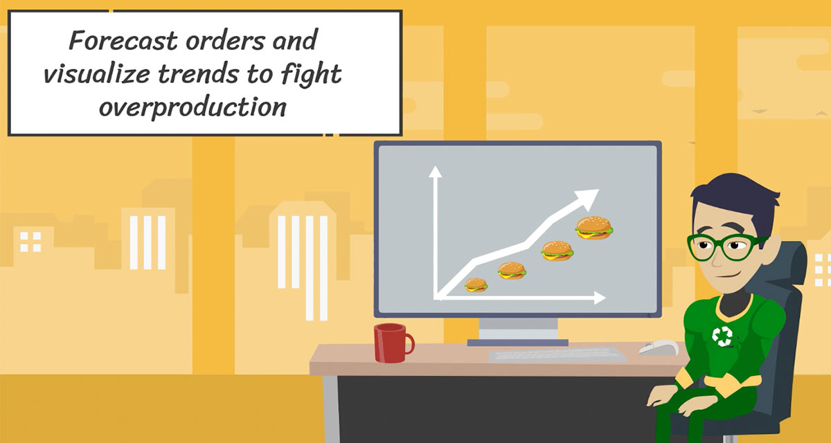 Animated super hero in green sitting at desk watching computer screen with a forecasting graph