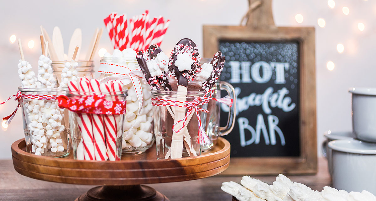 Hot Chocolate Station with candy canes, chocoate, marshmellows and other toppings