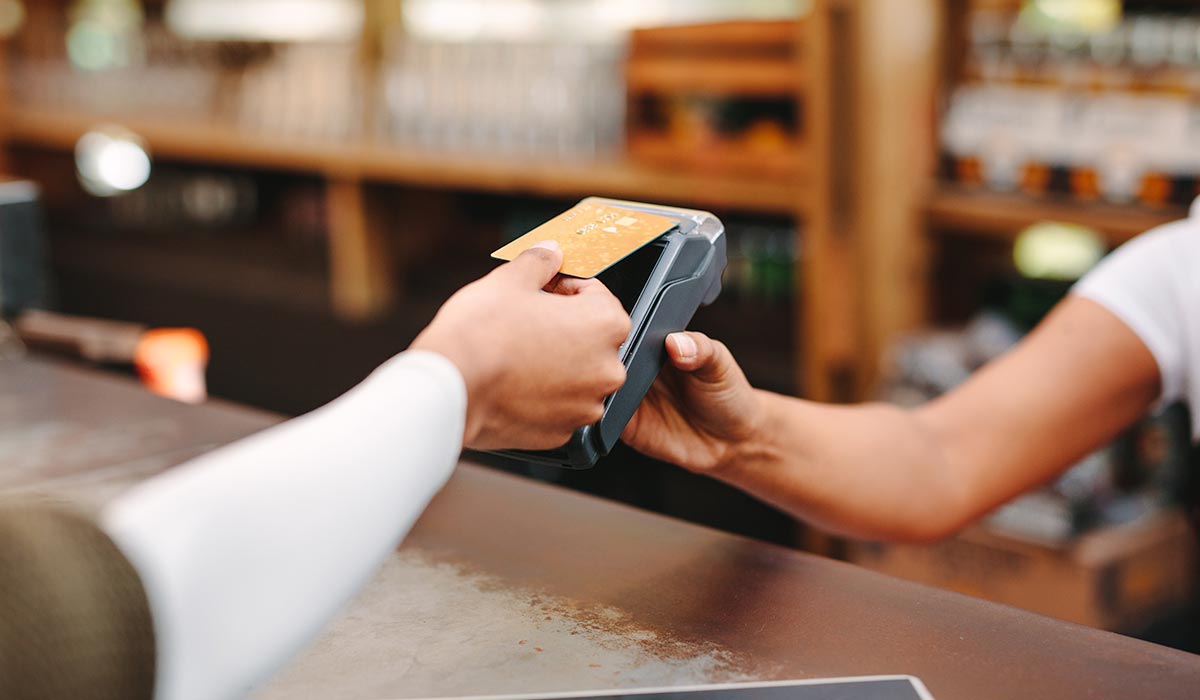 Customer using credit card tap option to pay 
