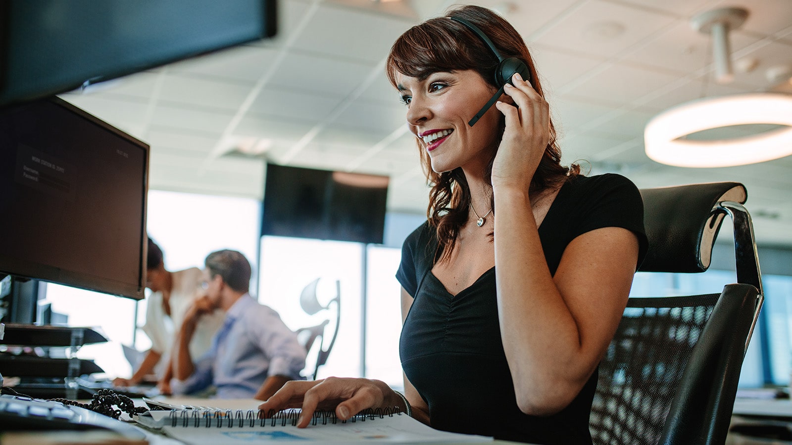 CAll center business woman talking on phone