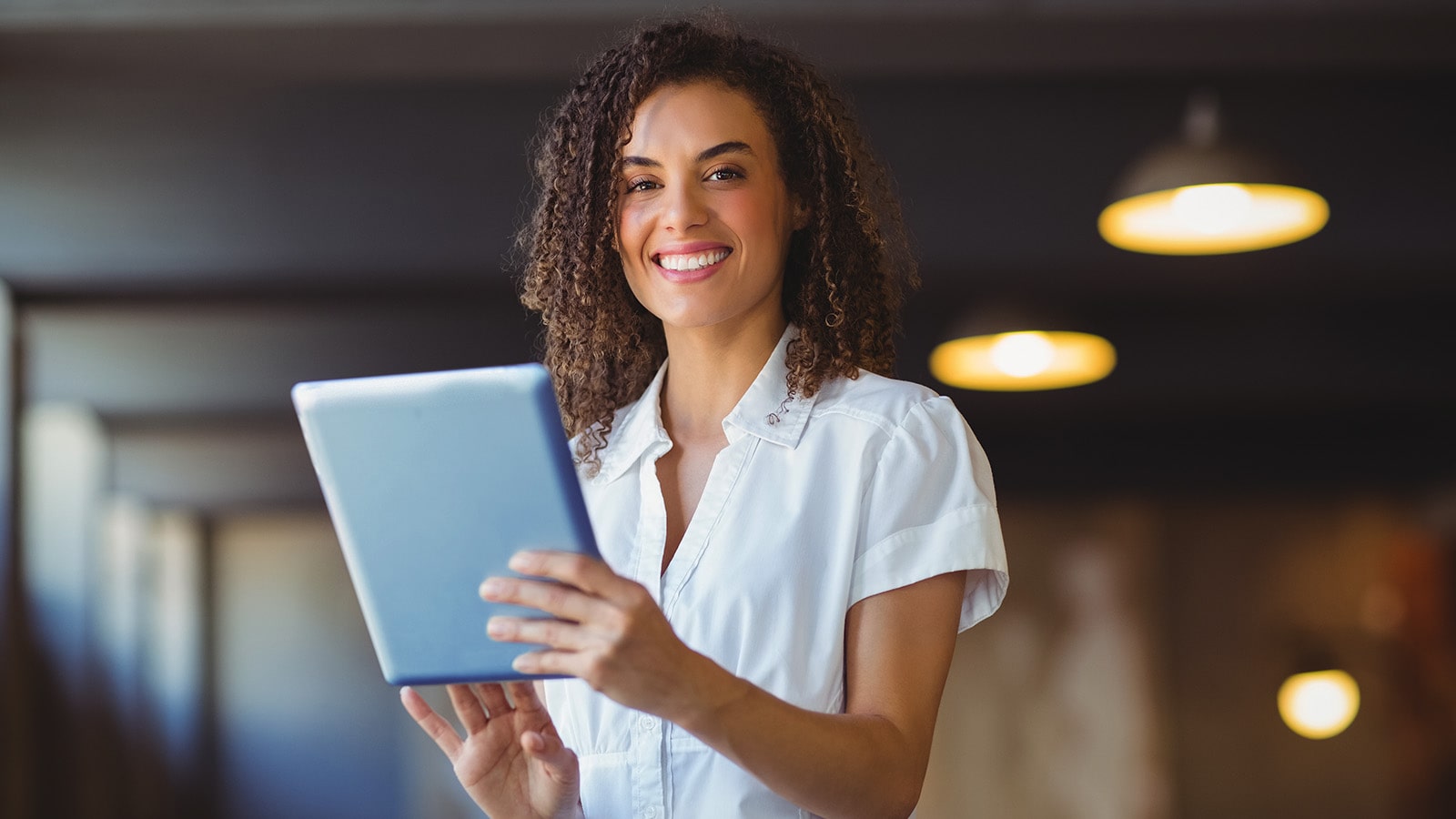 Business woman sitting at her desk working